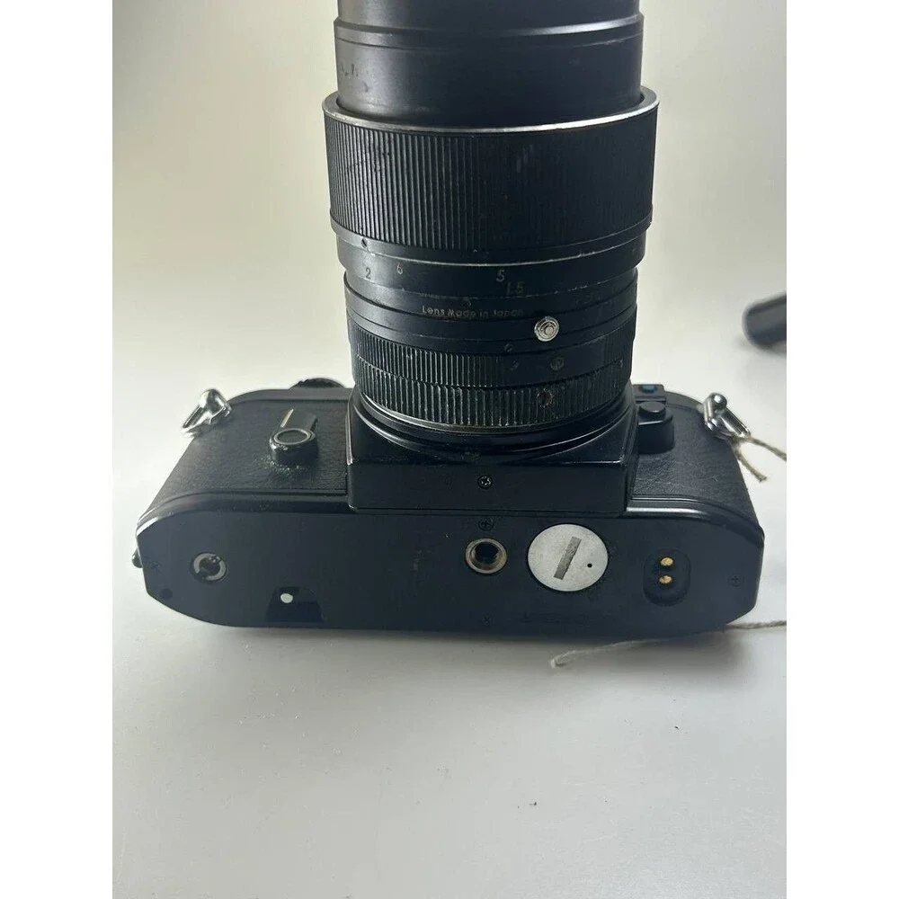 UNTESTED AS IS Nikon EM 35mm SLR Film Camera with Aetna Rokunar YS 135mm f/2.8 L